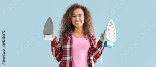 Young woman with irons on g...