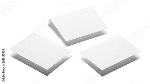 Three white business cards with shadows on white transparent background