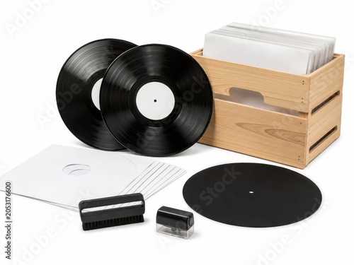 Vinyl Record Care And Listening Set With Blank Label Records Record Brush Stylus Cleaner Protective Inner Sleeves Plain Storage Crate And A Simple Turntable Slipmat Isolated On White Background