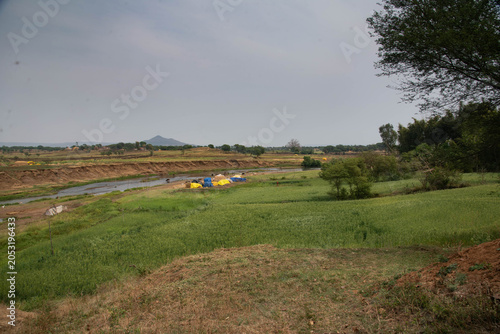 tractor spraying field
