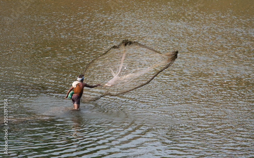 fisher man in the water