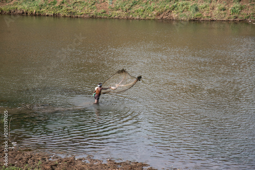 fisher man in the water
