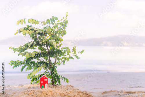 Christmas toys on the beach of tropical resort on the beach. Concept could be used for New Year and Christmas Cards at Phuket Thailand