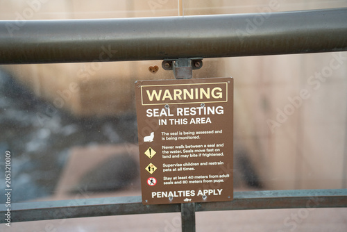 Seal resting warning sign in Sydney Harbour