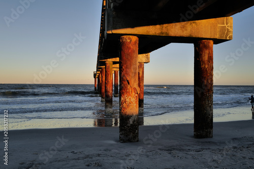 Konstfotografi The wooden pier on St. Augustine Beach in Florida at Sunset