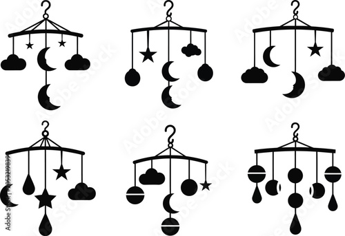 Black silhouettes of baby mobiles with celestial objects hanging with white background
