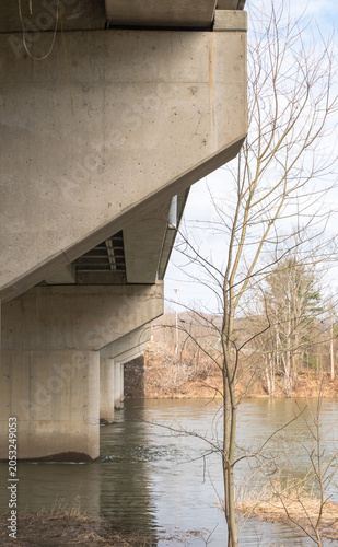 A bridge carrying State Route 62 over the Allegheny River in Warren County, Pennsylvania, USA on an overcast spring day