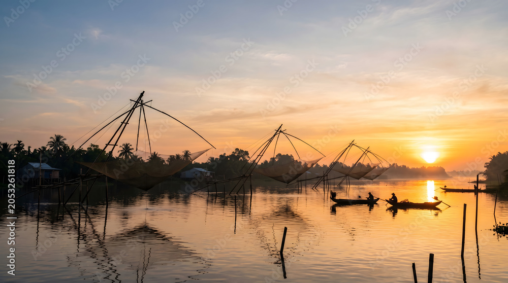 Fototapeta premium Traditional Chinese Fishing Nets at Sunrise on Tropical River Landscape