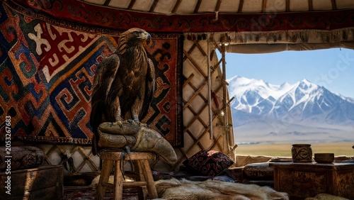 Colorful felt shyrdak rug on yurt lattice, golden eagle on glove, Central Asian nomadic concept. event programs, museum guides, designed for cultural heritage projects and event programs.