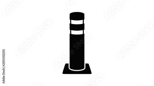 фотографія Black traffic bollard post isolated on dark background.