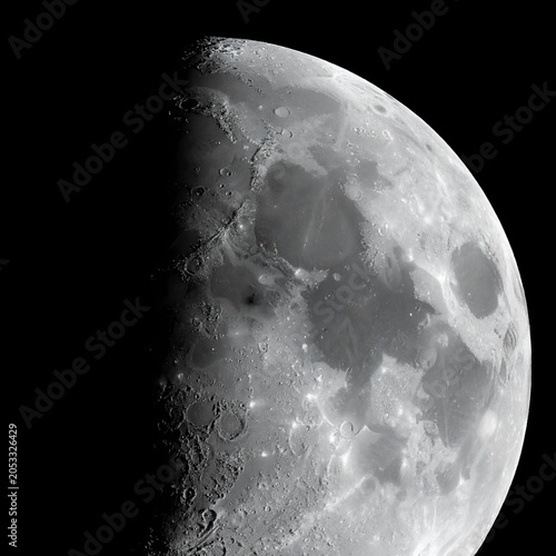 Detailed Half Moon Surface Against Deep Black Night Sky