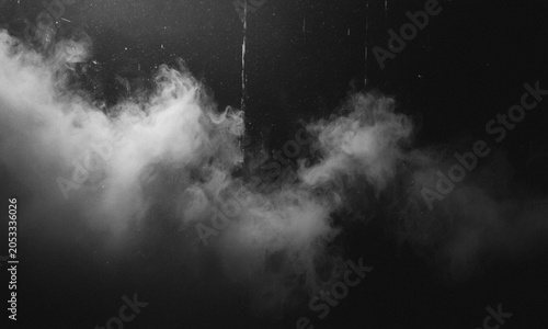 Wispy smoke plumes in dramatic studio lighting against a dark backdrop conveying mystery and atmosphere