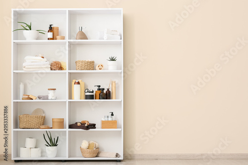 White bathroom shelf with p...