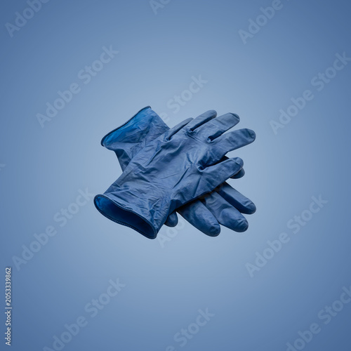 Pair of Blue Work Gloves on Gradient Background