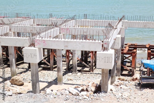 Fotografie Buildings near the sea face harsh environmental conditions, including salinity, storms, and humidity