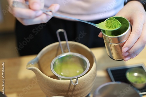 pouring water into glass