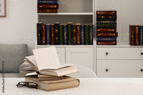 Open book and reading glass...