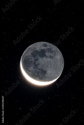 Konstfotografi Waning Crescent Moon with Earthshine and Stars