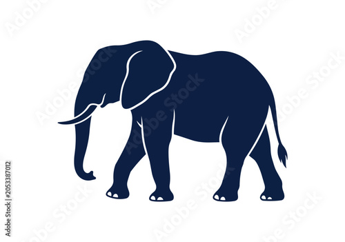 Silhouette of an African Elephant Walking Left.