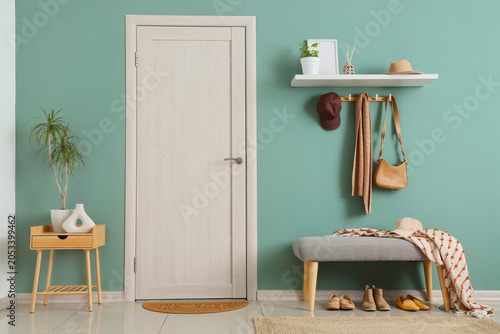 Modern home entryway with g...