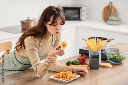 Young woman enjoying delici...