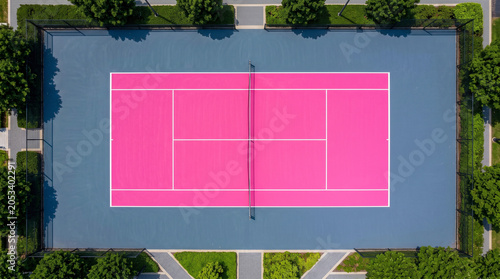 Perfectly Symmetrical Top Down View of a Bright Pink Tennis Court with White Lines 