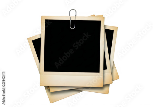 Stack of blank Polaroid photos with paperclip on white background transparent background