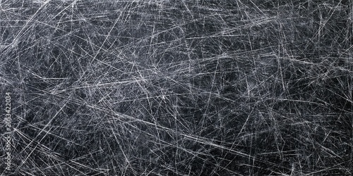 Monochrome Textured Dark Base Numerous Fine Bright White Scratches Thin Irregular Intersecting Lines Strong Visual Impact Heavily Abraded Surface