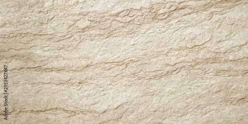 Textured beige surface with horizontal, wavy lines and rough details