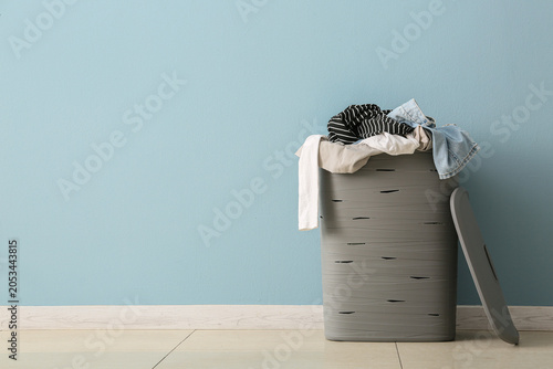 Laundry basket overflowing ...