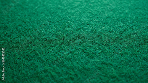 Close up of green casino baize felt texture