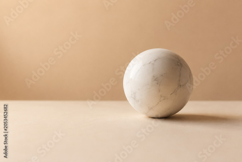 AI generated minimalist composition featuring smooth marble sphere clean surface symbolizing balance simplicity harmony perfection stability modern design abstract elegance