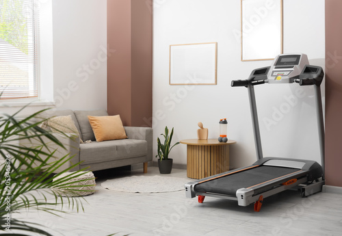 Modern home gym interior wi...