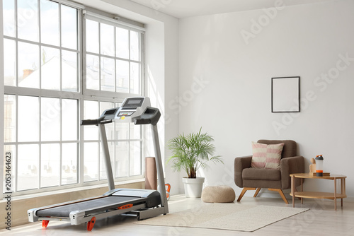 Modern home gym interior wi...