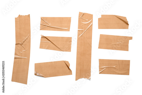 Brown adhesive tape pieces ...