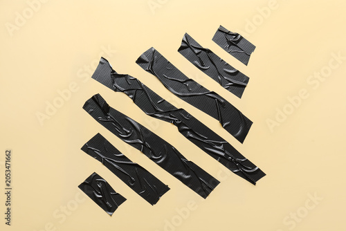 Black duct tape strips with...