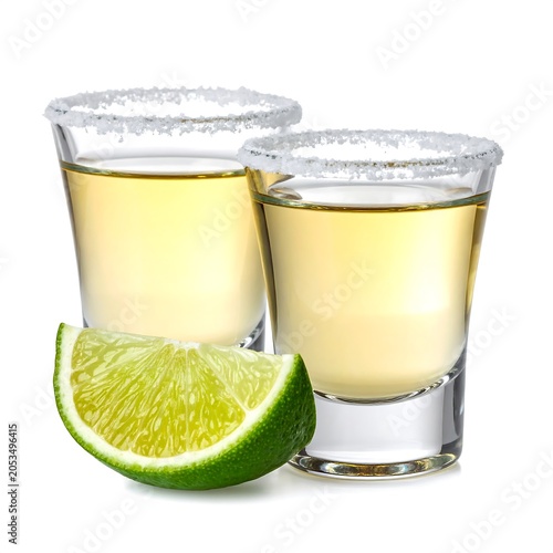 Tequila shots with lime wedge and salt rim on white background