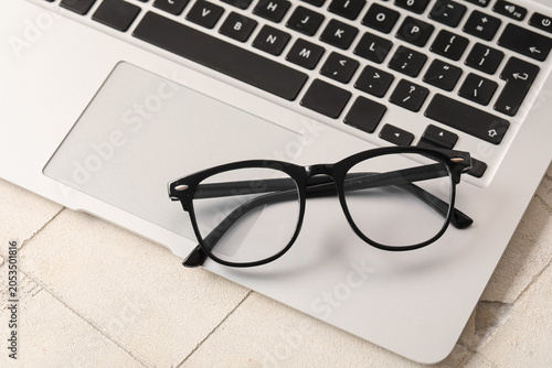 Black frame eyeglasses on s...