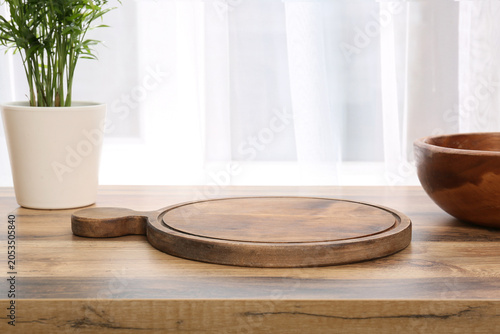 Empty wooden pizza board on...