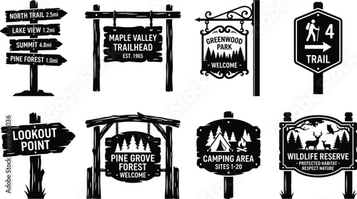 Bild auf Leinwand Rustic Hiking Trail and Camping Sign Collection with Wooden Forest Wayfinding Si