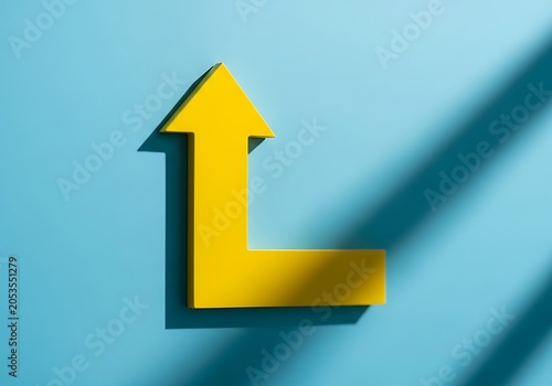 Yellow arrow pointing up on blue background