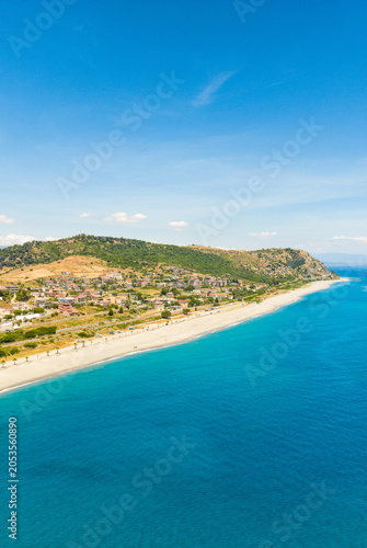 The Mediterranean Sea in Summer and the Cliff di Bianco on the coast