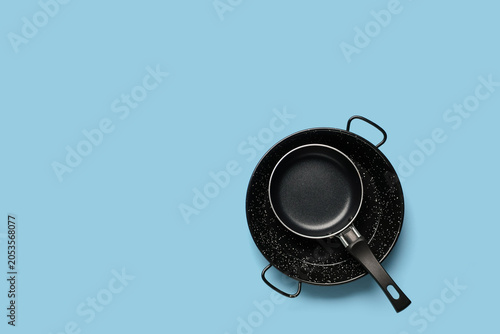 Black frying pan and paella...
