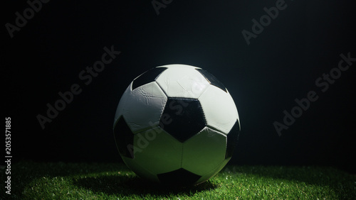 All set of flashing lights for the final soccer match on a green field