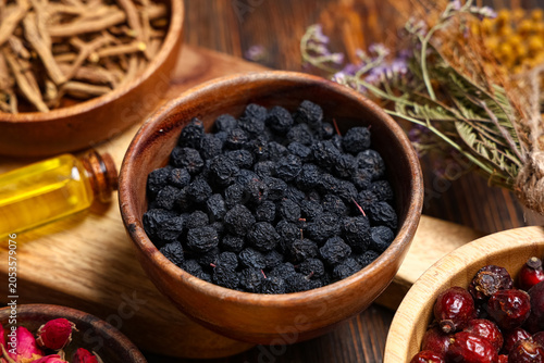 Bowls with dried berries, r...