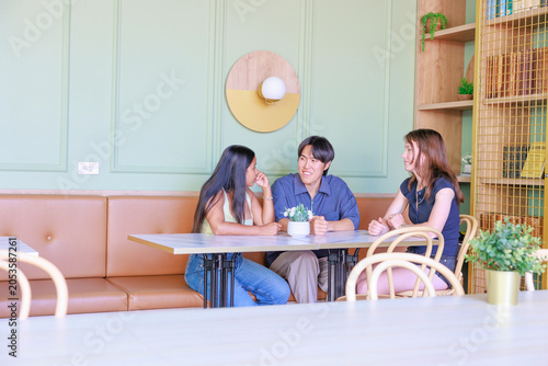 Young Students Socializing at Cafe During Study Break