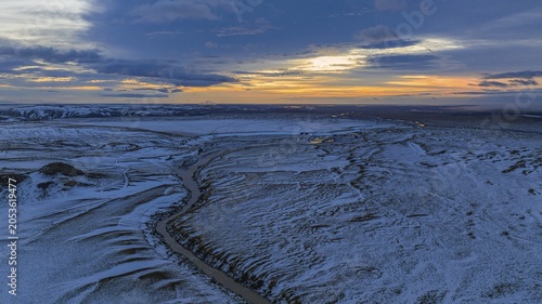 Overgrown river landscape, onset of winter, sunset, Fjallabak Nature Reserve, drone shot, Sudurland, Iceland