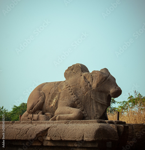 Cave 21 at ellora caves with nandi bull statue in foreground. ellora, maharashtra, india featuring the sacred 
