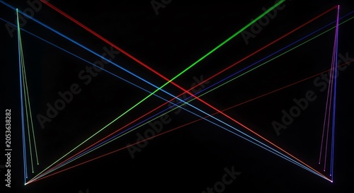 Colorful laser beams on black background