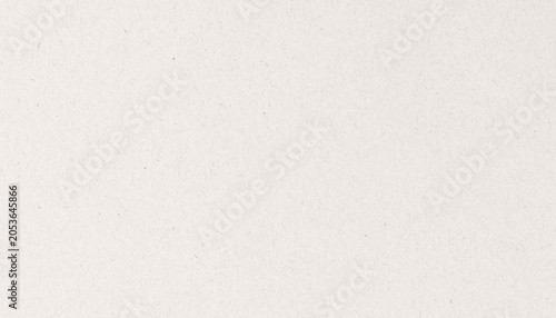 Fotografie Close-up of a textured, off-white paper surface with subtle speckles